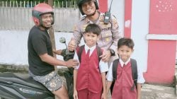 Kapolres Palopo Pantau Arus Lalin dan Menyeberangkan Anak Sekolah